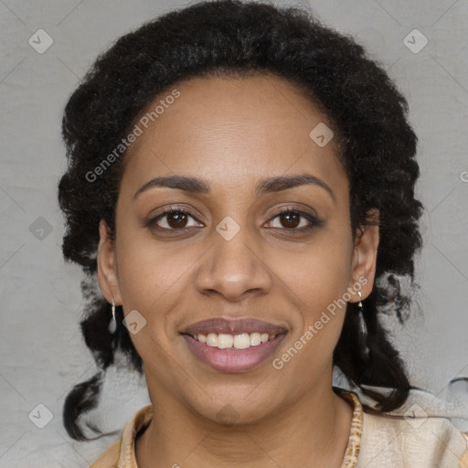 Joyful black young-adult female with long  brown hair and brown eyes