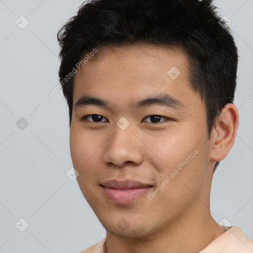 Joyful asian young-adult male with short  brown hair and brown eyes