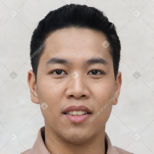 Joyful asian young-adult male with short  black hair and brown eyes