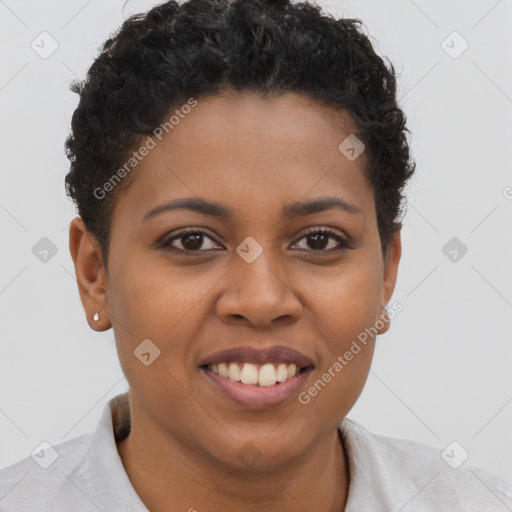 Joyful black young-adult female with short  brown hair and brown eyes