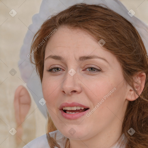 Joyful white adult female with medium  brown hair and brown eyes