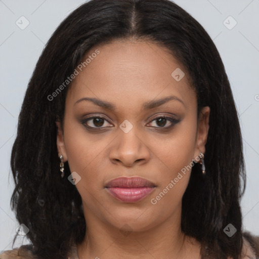 Joyful black young-adult female with long  brown hair and brown eyes