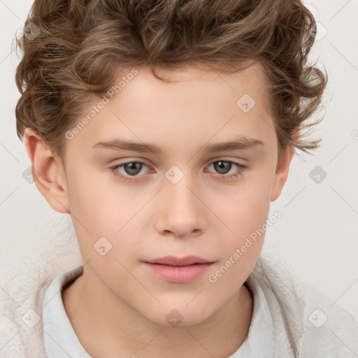 Joyful white child male with short  brown hair and brown eyes