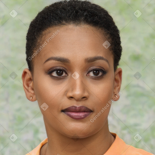 Joyful black young-adult female with short  brown hair and brown eyes