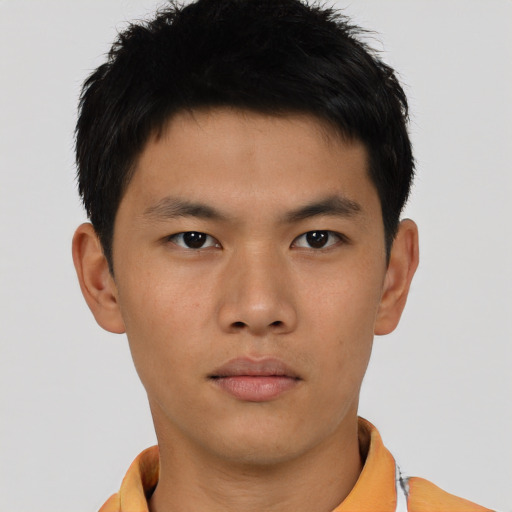 Neutral asian young-adult male with short  brown hair and brown eyes