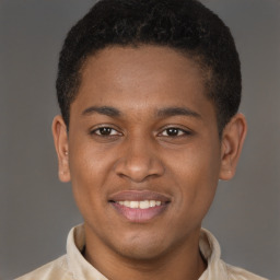 Joyful latino young-adult male with short  brown hair and brown eyes