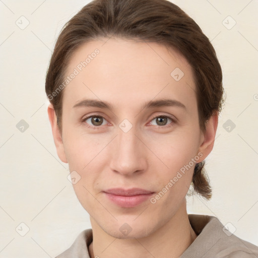 Neutral white young-adult female with short  brown hair and brown eyes