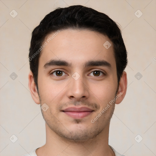 Joyful white young-adult male with short  black hair and brown eyes