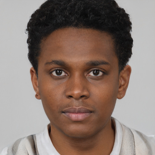 Neutral black young-adult male with short  brown hair and brown eyes