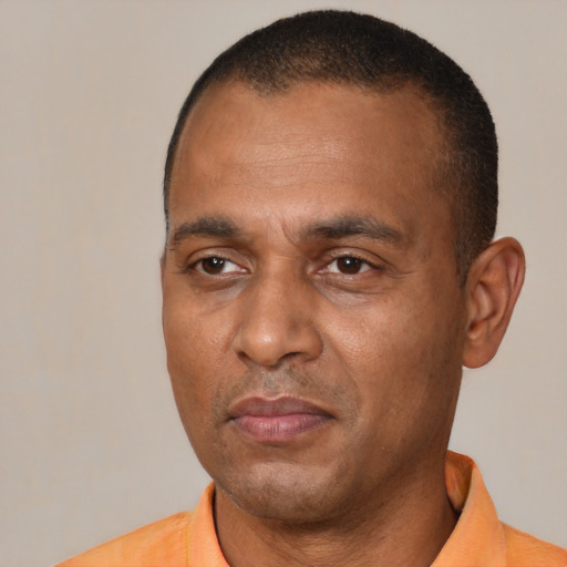 Neutral black adult male with short  black hair and brown eyes