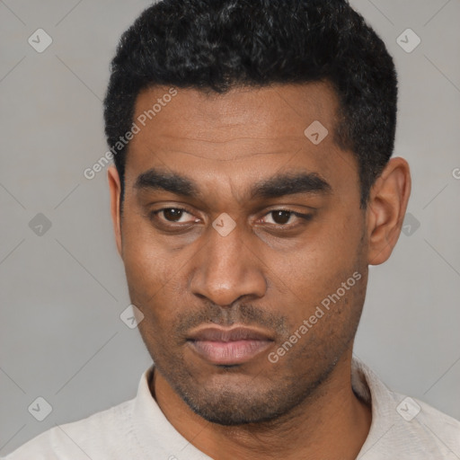 Neutral latino young-adult male with short  black hair and brown eyes