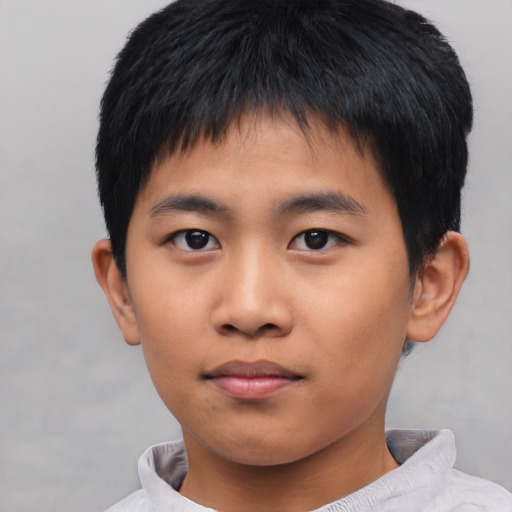 Neutral asian child male with short  black hair and brown eyes