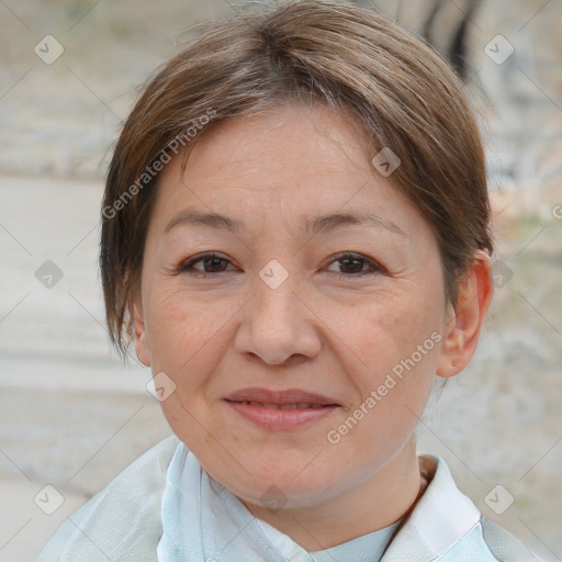 Joyful white adult female with short  brown hair and brown eyes