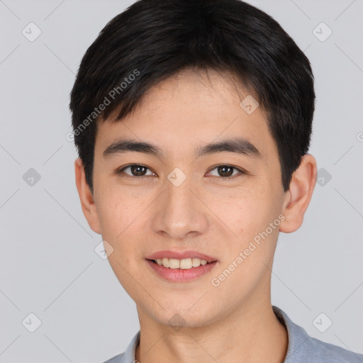 Joyful white young-adult male with short  black hair and brown eyes