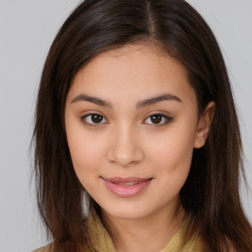 Joyful white young-adult female with long  brown hair and brown eyes