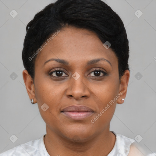 Joyful black young-adult female with short  brown hair and brown eyes