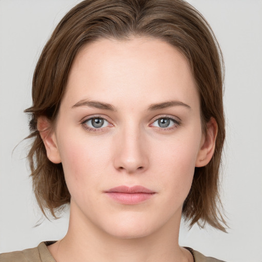 Neutral white young-adult female with medium  brown hair and blue eyes