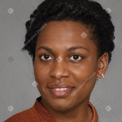 Joyful black young-adult female with short  brown hair and brown eyes