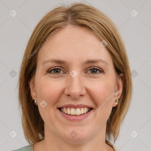 Joyful white young-adult female with medium  brown hair and green eyes