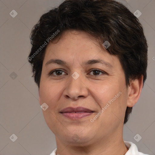 Joyful white adult female with short  brown hair and brown eyes