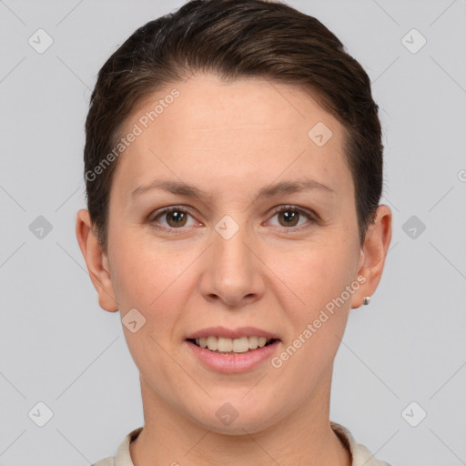 Joyful white young-adult female with short  brown hair and brown eyes