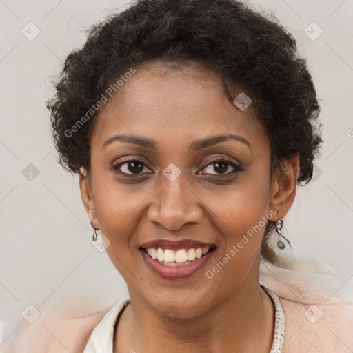 Joyful black young-adult female with short  brown hair and brown eyes