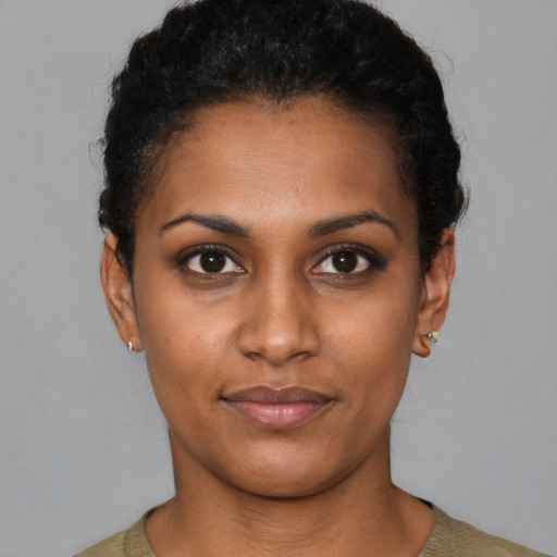 Neutral black young-adult female with short  black hair and brown eyes