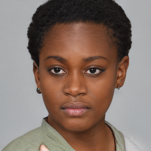 Neutral black young-adult female with short  brown hair and brown eyes