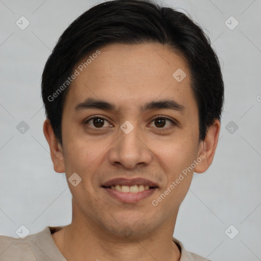 Joyful white young-adult male with short  black hair and brown eyes