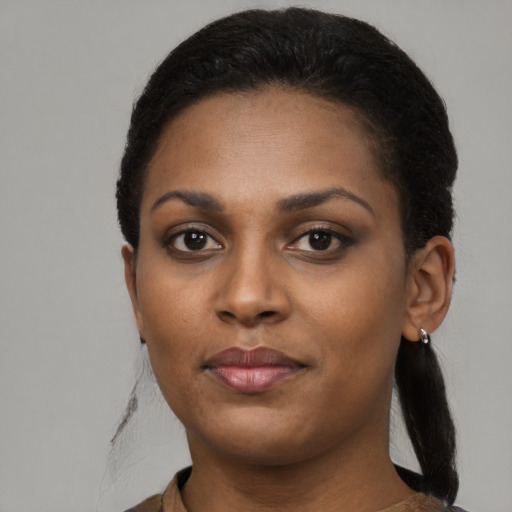 Neutral black young-adult female with long  black hair and brown eyes