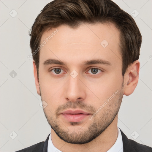 Neutral white young-adult male with short  brown hair and brown eyes