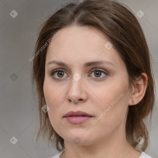 Neutral white young-adult female with medium  brown hair and brown eyes