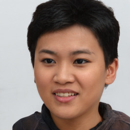 Joyful asian young-adult female with short  black hair and brown eyes