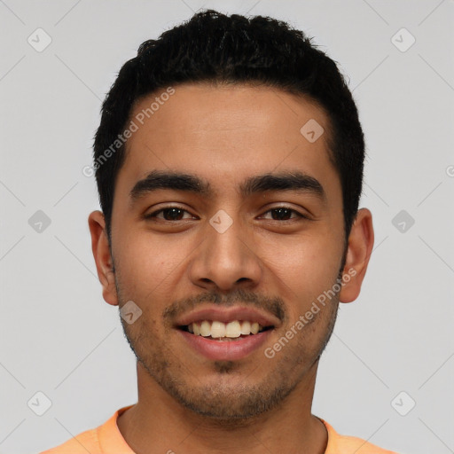 Joyful latino young-adult male with short  black hair and brown eyes