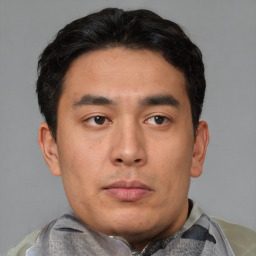 Neutral asian young-adult male with short  brown hair and brown eyes