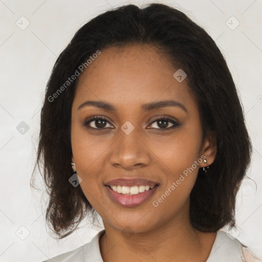 Joyful black young-adult female with medium  brown hair and brown eyes