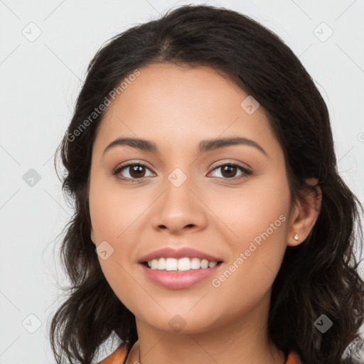 Joyful latino young-adult female with long  brown hair and brown eyes