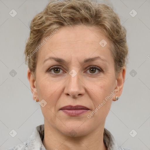 Joyful white adult female with short  brown hair and grey eyes