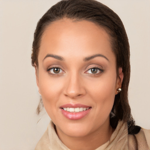 Joyful white young-adult female with long  brown hair and brown eyes