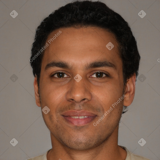 Joyful latino young-adult male with short  brown hair and brown eyes
