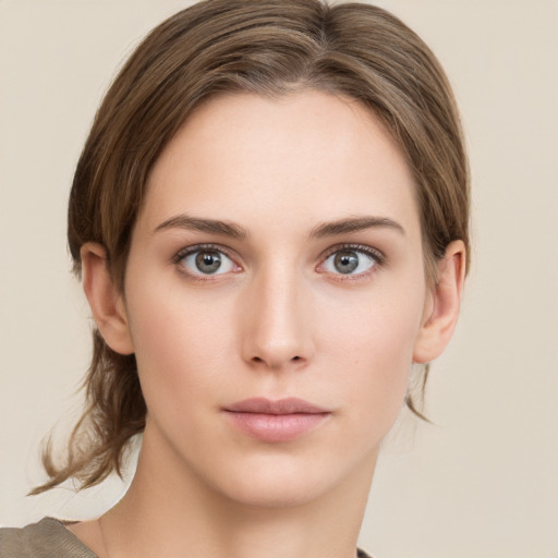 Neutral white young-adult female with medium  brown hair and grey eyes