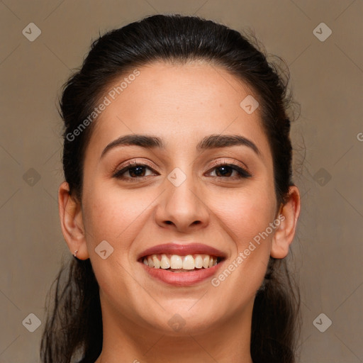 Joyful white young-adult female with long  brown hair and brown eyes