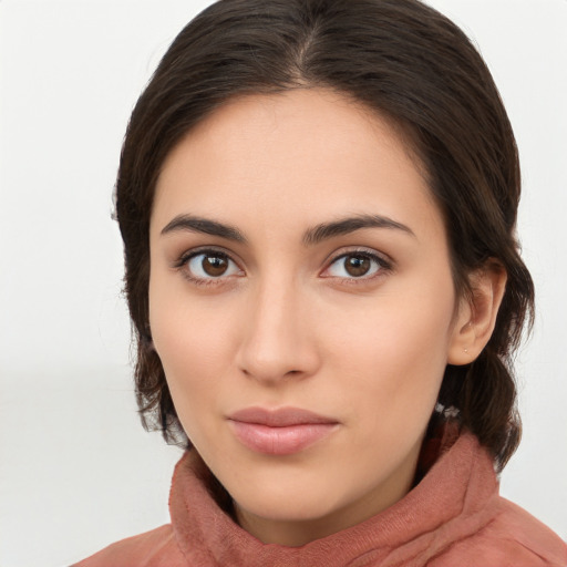 Neutral white young-adult female with medium  brown hair and brown eyes