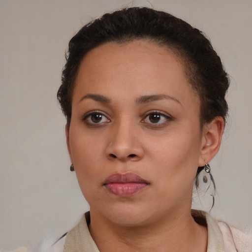 Neutral latino young-adult female with short  brown hair and brown eyes