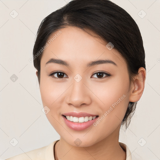 Joyful white young-adult female with medium  brown hair and brown eyes