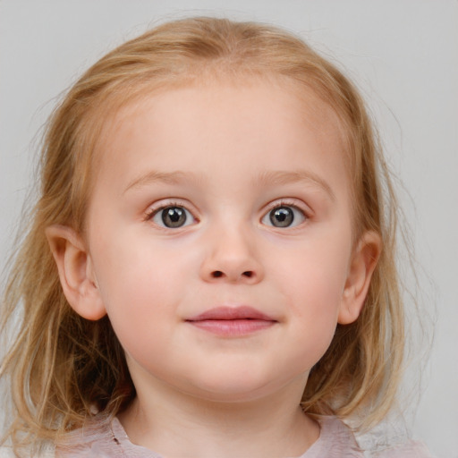 Joyful white child female with medium  brown hair and blue eyes