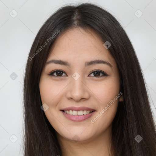 Joyful white young-adult female with long  brown hair and brown eyes