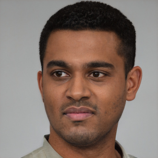 Neutral black young-adult male with short  black hair and brown eyes