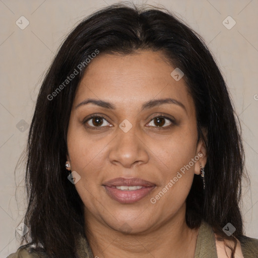 Joyful black adult female with medium  brown hair and brown eyes