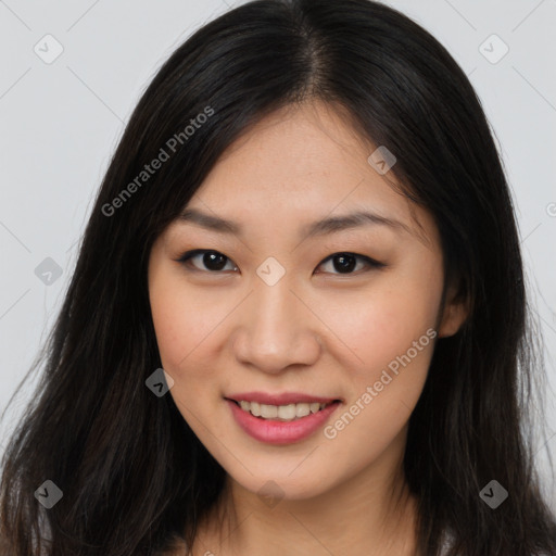 Joyful asian young-adult female with long  brown hair and brown eyes